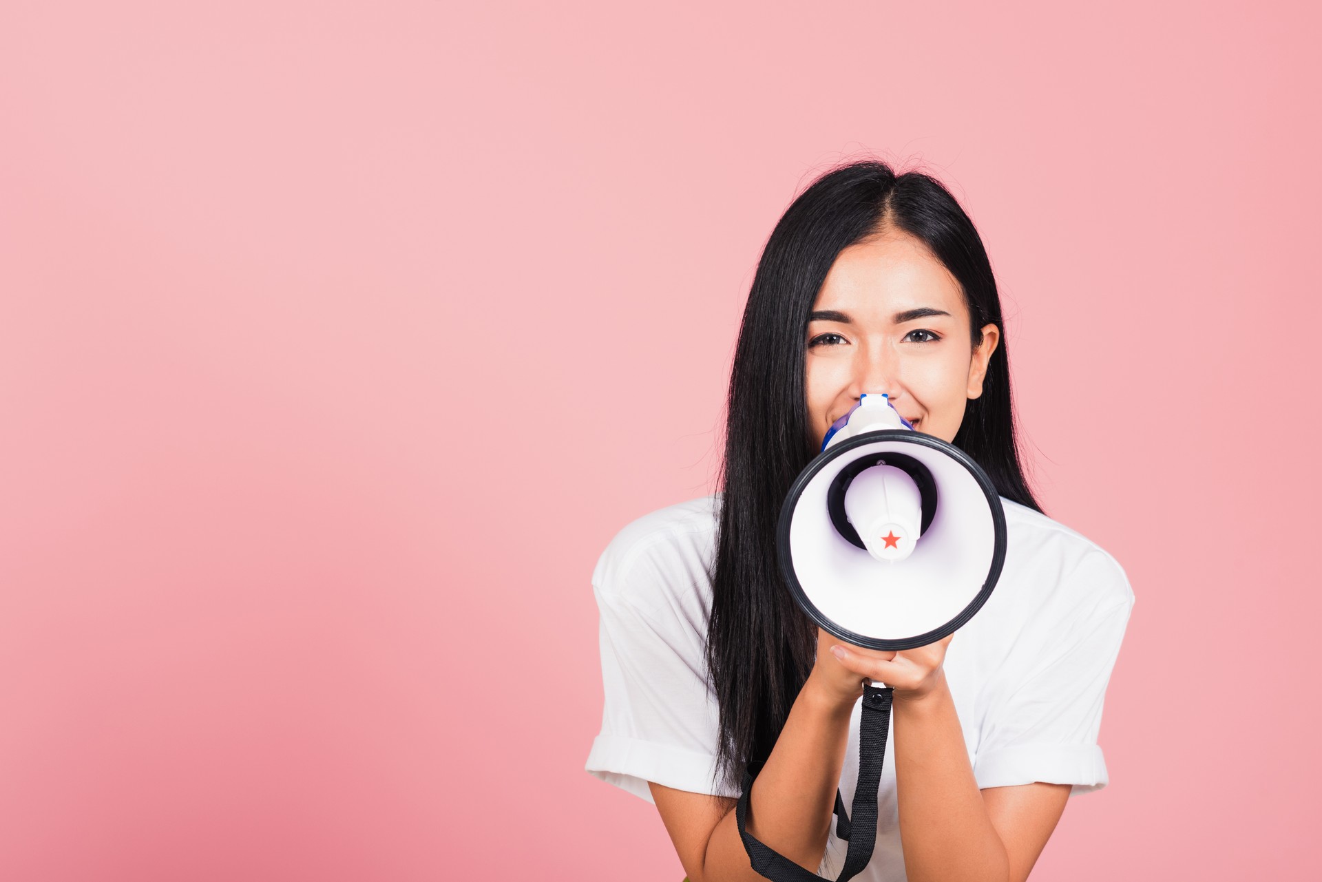 woman teen confident smiling face holding making announcement message shouting screaming in megaphone